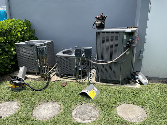 Three Rheem Condensers